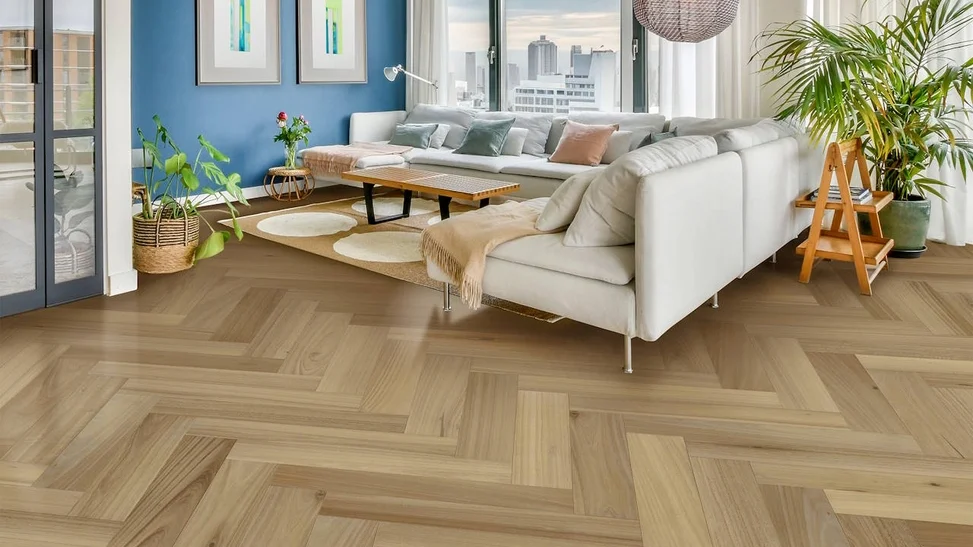 Instalación de parquet de madera en espiga clasico con lama ancha.